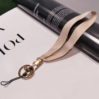 Mobilā tālruņa aukla sieviešu plaukstas virve plata auduma īsa štrope siksniņa kulonu apvalka rotājumi pārnēsājams noņemams atslēgu piekariņš