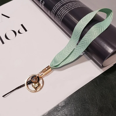 Mobilā tālruņa aukla sieviešu plaukstas virve plata auduma īsa štrope siksniņa kulonu apvalka rotājumi pārnēsājams noņemams atslēgu piekariņš