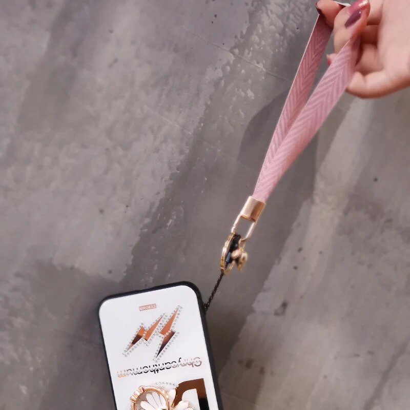 Mobilā tālruņa aukla sieviešu plaukstas virve plata auduma īsa štrope siksniņa kulonu apvalka rotājumi pārnēsājams noņemams atslēgu piekariņš