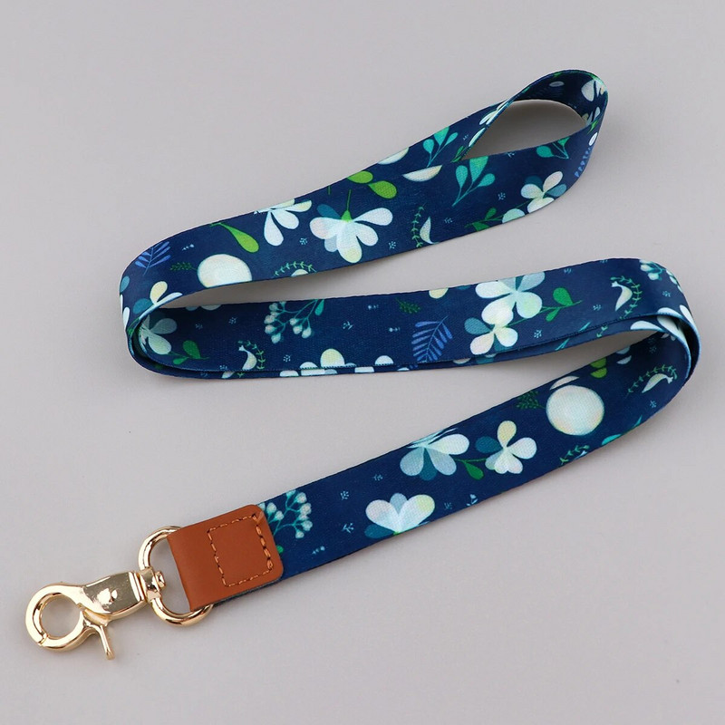 Ransitute R2801 Fashion Flowers Serie Ādas sprādzes Virves emblēmas ID Virves Tālruņa virve Atslēgas Virves kakla siksnas aksesuāri