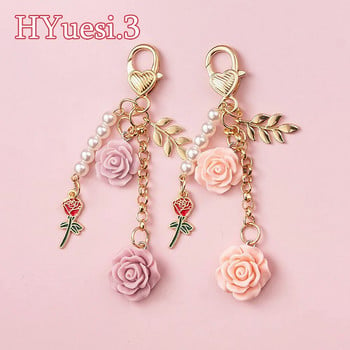 8 цвята 3D Rose Camellia Keychain Women Girls Sweet Pearl Tassel Flower Ключодържател с метални листа за калъф за слушалки Декорация на чанта