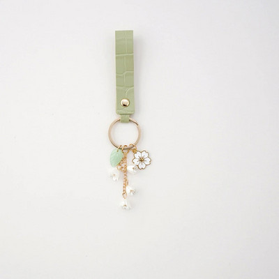 Modes lentes priekšgala pērļu piekarināmais atslēgu piekariņš iPhone tālrunim Samsung sievietēm mobilā tālruņa soma Automašīnas atslēgu piekariņš šarmu dekoru vairumtirdzniecība