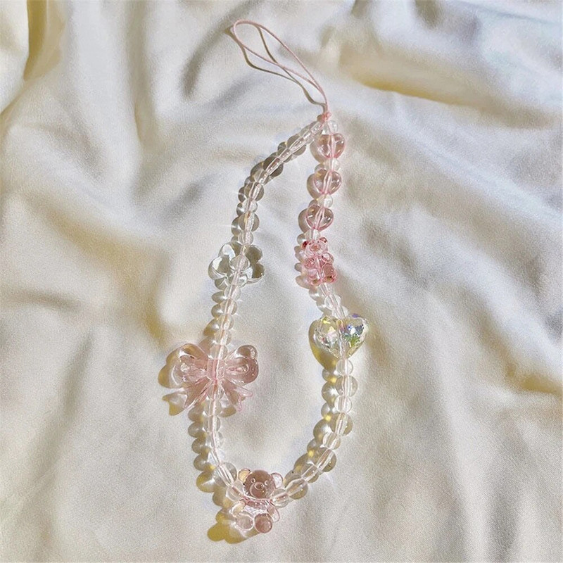 Kristāla jewry ziedi ar pērlītēm mobilā tālruņa ķēde pret pazaudēšanu virves siksna Akrila pērlītes mobilā tālruņa futrālis, pakarināms ar vadu