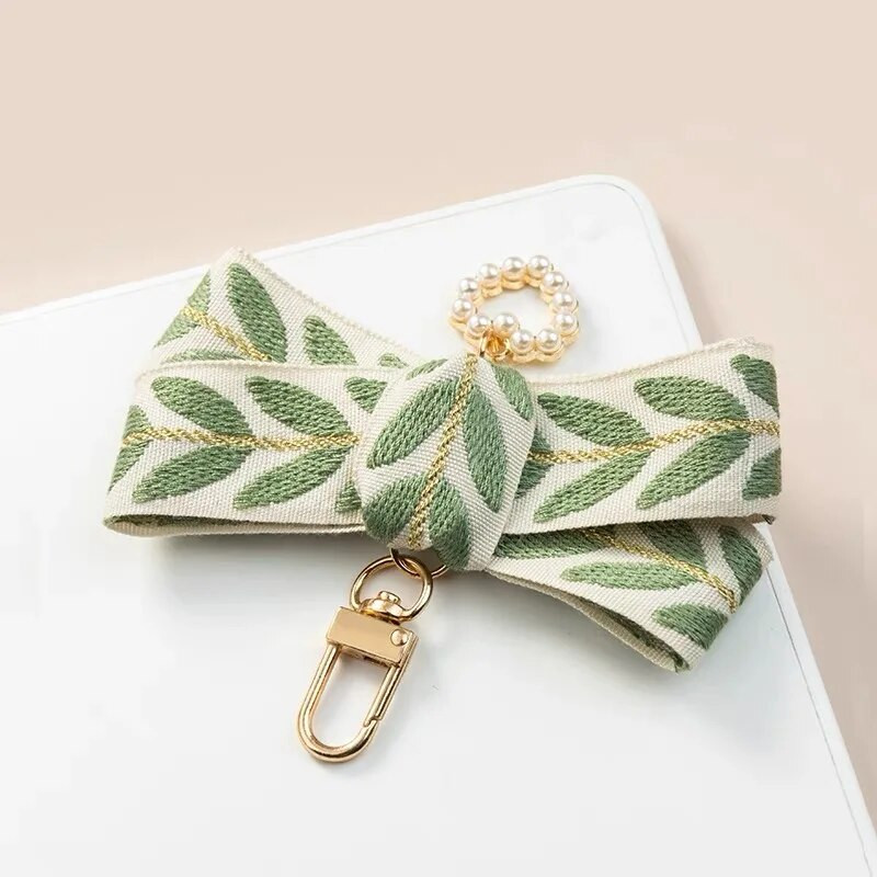 Kwaii valge pärliga helmestega võtmehoidja Creative Leaf lindist käevõru võtmehoidja naistele tüdrukutele auto käekoti telefoniümbris rippuvad kingitused