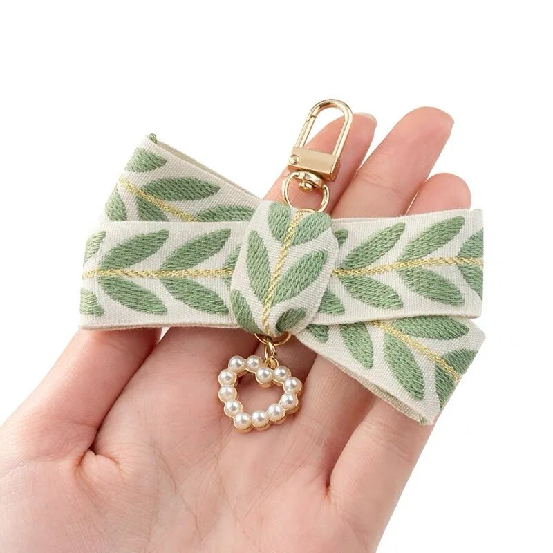 Kwaii valge pärliga helmestega võtmehoidja Creative Leaf lindist käevõru võtmehoidja naistele tüdrukutele auto käekoti telefoniümbris rippuvad kingitused