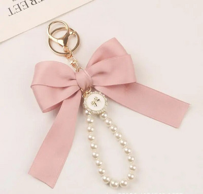 Jauns liels loks atslēgu piekariņš, pērļu atslēgu piekariņš, automašīnas kulons, radošs krāsains lentes audums, mezgls atslēgu piekariņu aksesuāri K5192