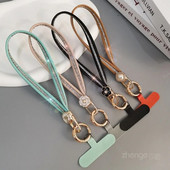 Mobiiltelefoni kaelapael, lilleline, kõrgekvaliteediline naiste nahast randmepael, kaasaskantav ripatsiga kett, telefoniümbris, kaotsiminekuvastane pael