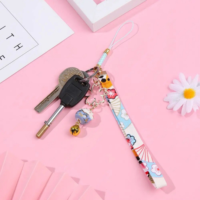 Modes kulons ziedu rokassprādze Mobilā tālruņa aukla Kristāla tālruņa siksniņas Piekarināma virve Siksna Rokas virve Pretnozaudēšanas aukla