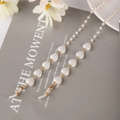 Krāsu Mīlestības Briļļu ķēde Viss vienā pērļu sirds formas maska Austiņas Pretzaudējumu vairumtirdzniecība Saulesbriļļu ķēde Sievietēm