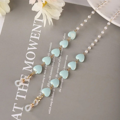 Krāsu Mīlestības Briļļu ķēde Viss vienā pērļu sirds formas maska Austiņas Pretzaudējumu vairumtirdzniecība Saulesbriļļu ķēde Sievietēm