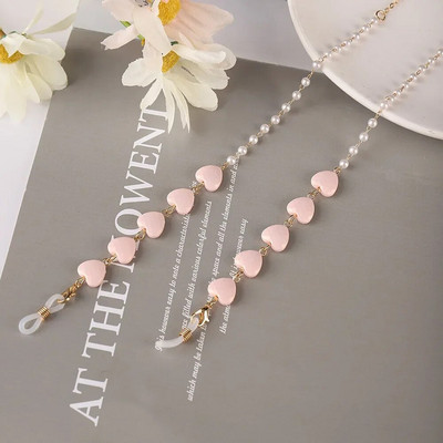 Krāsu Mīlestības Briļļu ķēde Viss vienā pērļu sirds formas maska Austiņas Pretzaudējumu vairumtirdzniecība Saulesbriļļu ķēde Sievietēm