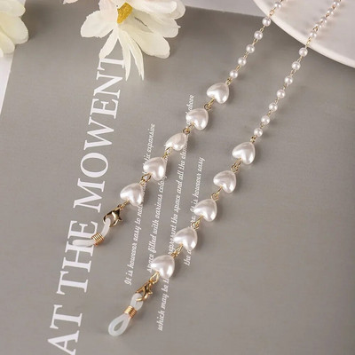 Krāsu Mīlestības Briļļu ķēde Viss vienā pērļu sirds formas maska Austiņas Pretzaudējumu vairumtirdzniecība Saulesbriļļu ķēde Sievietēm