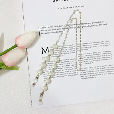 Krāsu Mīlestības Briļļu ķēde Viss vienā pērļu sirds formas maska Austiņas Pretzaudējumu vairumtirdzniecība Saulesbriļļu ķēde Sievietēm