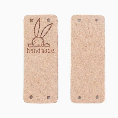 20 tk Küüliku käsitsi valmistatud sildid Käsitsi valmistatud etiketile Kawaii õmblemine nahast sildid mütsidele Kootud dekoratiivsed riided kingitused kotid 2x5 cm