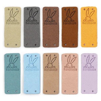 20 tk Küüliku käsitsi valmistatud sildid Käsitsi valmistatud etiketile Kawaii õmblemine nahast sildid mütsidele Kootud dekoratiivsed riided kingitused kotid 2x5 cm