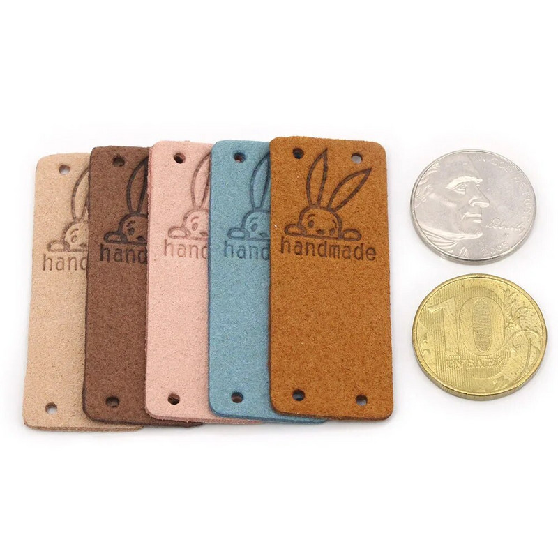 20 tk Küüliku käsitsi valmistatud sildid Käsitsi valmistatud etiketile Kawaii õmblemine nahast sildid mütsidele Kootud dekoratiivsed riided kingitused kotid 2x5 cm