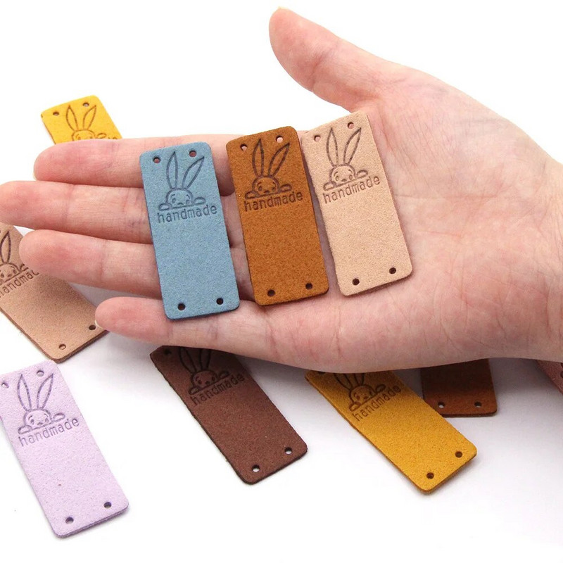 20 tk Küüliku käsitsi valmistatud sildid Käsitsi valmistatud etiketile Kawaii õmblemine nahast sildid mütsidele Kootud dekoratiivsed riided kingitused kotid 2x5 cm