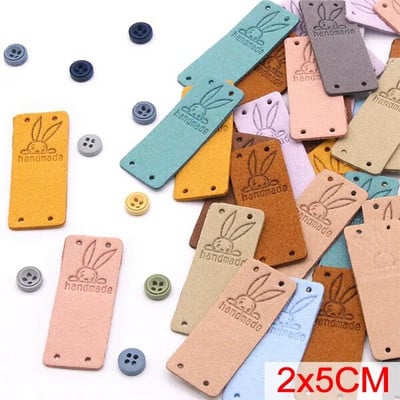 20gab. Roku darbs ar mīlestības etiķetēm apģērbam. Dzija bumbu ar rokām darināta ādas etiķete šūšana uz cepurēm Trikotāžas šūšanas piederumi