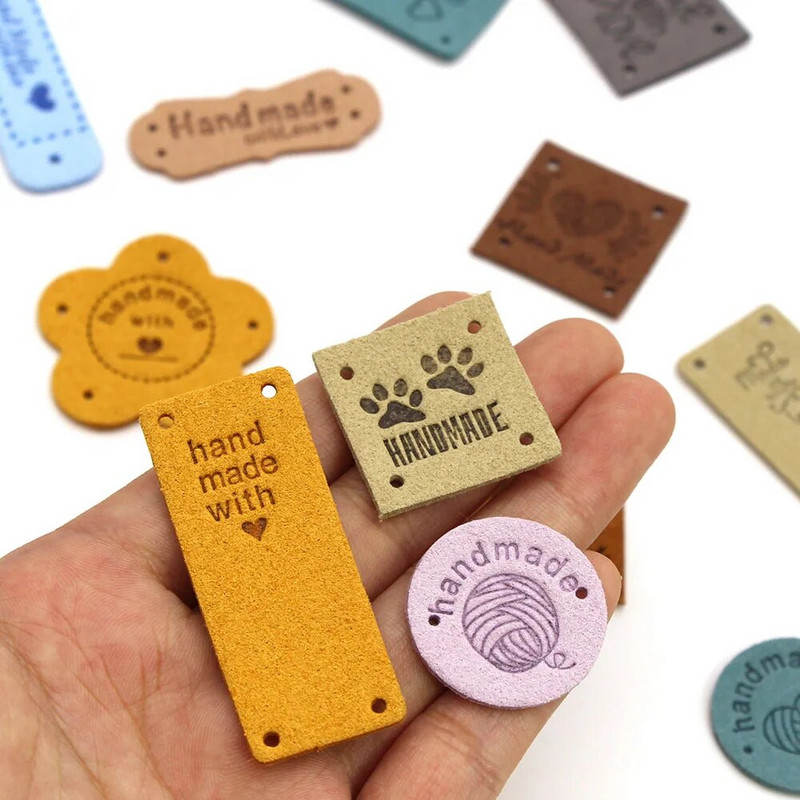 20gab. Roku darbs ar mīlestības etiķetēm apģērbam. Dzija bumbu ar rokām darināta ādas etiķete šūšana uz cepurēm Trikotāžas šūšanas piederumi