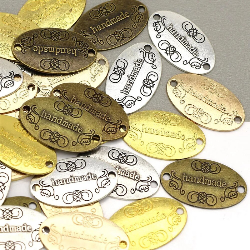 10 tk Käsitsi valmistatud sildid hõbedane pronks vibu metallist sildid riietele mütsid Vintage sulamist käsitsi valmistatud silt õmblustarvikud 31*19mm