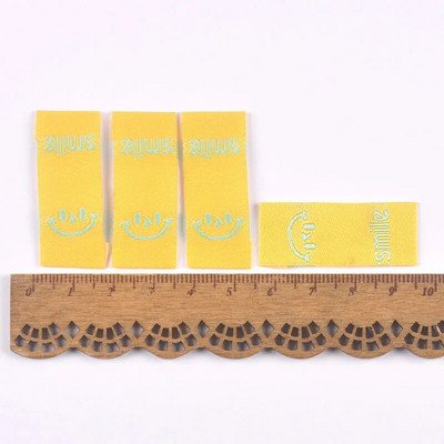 50Gb Krāsains smaids Izšuvums Colth Etiķetes Apģērba Mazgām Kopšanas Birkas Šūšanas Aksesuāri Amatniecība DIY Adīšanas soma Apavu piederumi