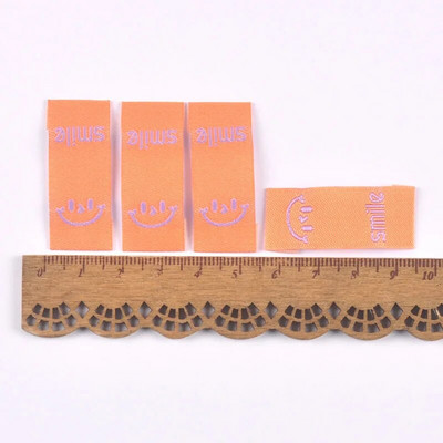 50Gb Krāsains smaids Izšuvums Colth Etiķetes Apģērba Mazgām Kopšanas Birkas Šūšanas Aksesuāri Amatniecība DIY Adīšanas soma Apavu piederumi