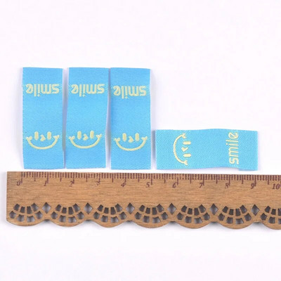 50Gb Krāsains smaids Izšuvums Colth Etiķetes Apģērba Mazgām Kopšanas Birkas Šūšanas Aksesuāri Amatniecība DIY Adīšanas soma Apavu piederumi