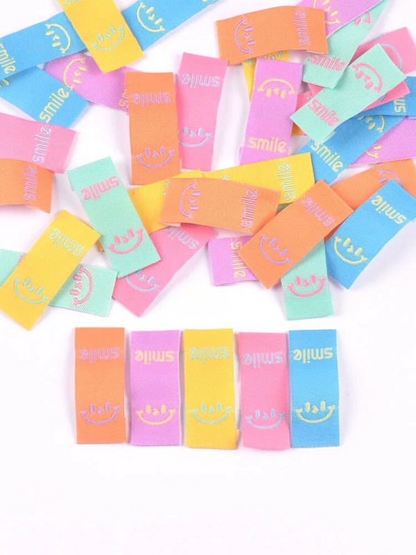 50Gb Krāsains smaids Izšuvums Colth Etiķetes Apģērba Mazgām Kopšanas Birkas Šūšanas Aksesuāri Amatniecība DIY Adīšanas soma Apavu piederumi