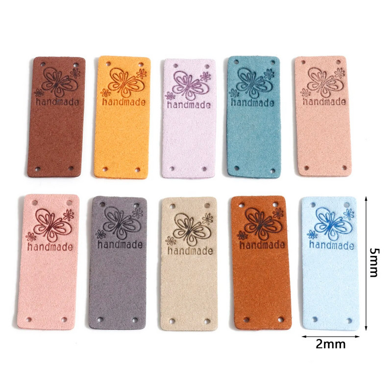 10 TK PU etiketisildid ristkülikukujuline liblika muster "käsitsi valmistatud" kunstnahast kunstnahast silt mütsi jaoks, rõivad, rõivad, õmblemine 5 cm x 2 cm