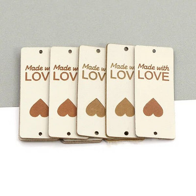 20 tk, mis on valmistatud armastussiltidega Käsitsi valmistatud silt Kunstlik PU-nahast sildid rõivastele Käsitsi valmistatud sildid mütside jaoks kootud õmblemine