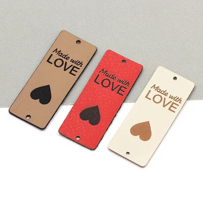 20 tk, mis on valmistatud armastussiltidega Käsitsi valmistatud silt Kunstlik PU-nahast sildid rõivastele Käsitsi valmistatud sildid mütside jaoks kootud õmblemine