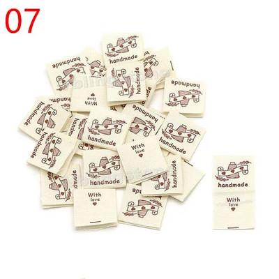 50 tk Käsitsi valmistatud riidest etiketid õmblusmasin jänes puuvillane kootud volditud sildid Beež käsitsi valmistatud silt kootud mütsidele 20x40MM
