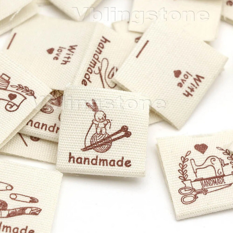 50 tk Käsitsi valmistatud riidest etiketid õmblusmasin jänes puuvillane kootud volditud sildid Beež käsitsi valmistatud silt kootud mütsidele 20x40MM