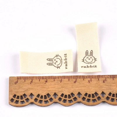 ανάμεικτα 50 τμχ Ζώο εμπριμέ μπεζ βαμβακερή υφασμένη ετικέτα για ετικέτες φροντίδας ρούχων Παπούτσια κινουμένων σχεδίων Τσάντες που πλένονται Ετικέτες ενδυμάτων CP2244