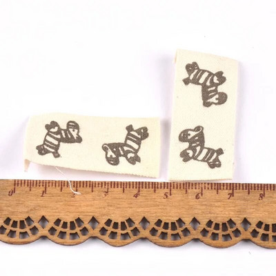 ανάμεικτα 50 τμχ Ζώο εμπριμέ μπεζ βαμβακερή υφασμένη ετικέτα για ετικέτες φροντίδας ρούχων Παπούτσια κινουμένων σχεδίων Τσάντες που πλένονται Ετικέτες ενδυμάτων CP2244