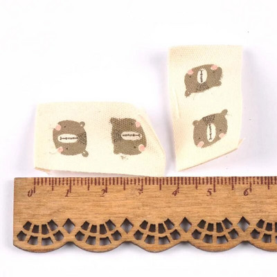 ανάμεικτα 50 τμχ Ζώο εμπριμέ μπεζ βαμβακερή υφασμένη ετικέτα για ετικέτες φροντίδας ρούχων Παπούτσια κινουμένων σχεδίων Τσάντες που πλένονται Ετικέτες ενδυμάτων CP2244