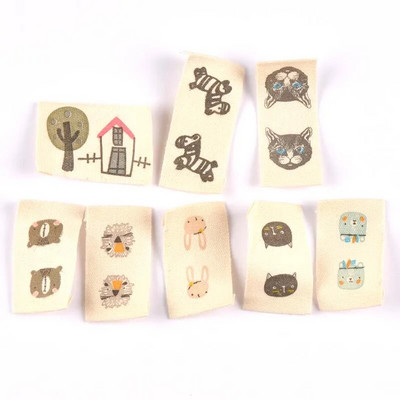 ανάμεικτα 50 τμχ Ζώο εμπριμέ μπεζ βαμβακερή υφασμένη ετικέτα για ετικέτες φροντίδας ρούχων Παπούτσια κινουμένων σχεδίων Τσάντες που πλένονται Ετικέτες ενδυμάτων CP2244