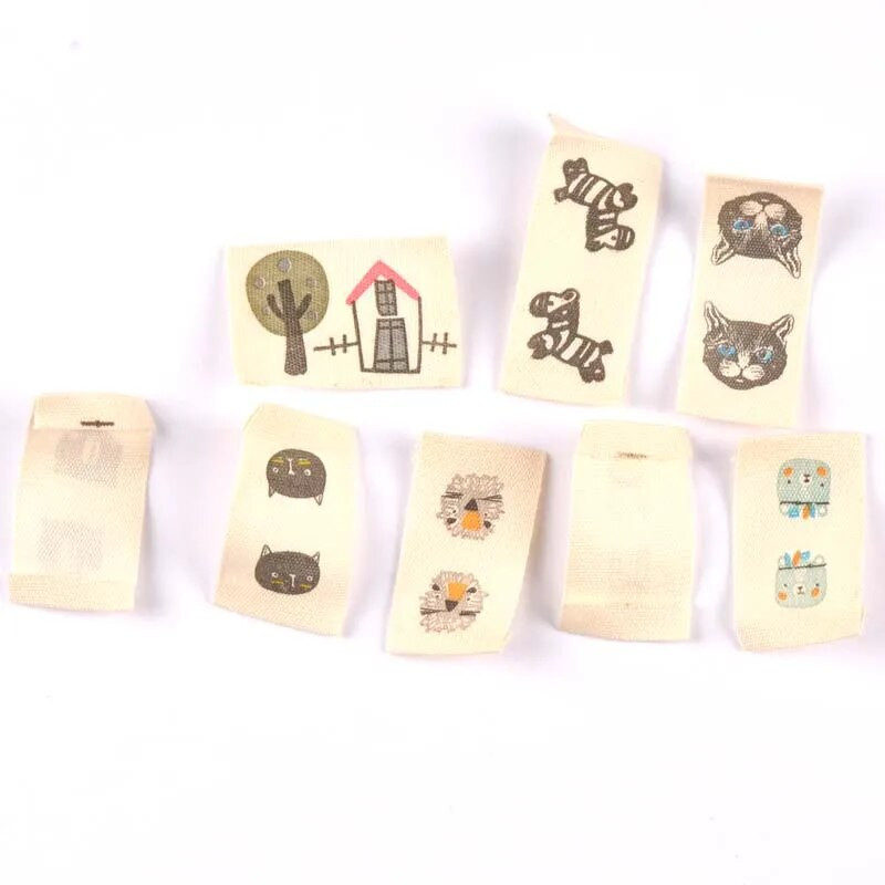ανάμεικτα 50 τμχ Ζώο εμπριμέ μπεζ βαμβακερή υφασμένη ετικέτα για ετικέτες φροντίδας ρούχων Παπούτσια κινουμένων σχεδίων Τσάντες που πλένονται Ετικέτες ενδυμάτων CP2244