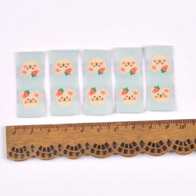 50Gb Karikatūras Dinozauru/Pingvīnu Etiķetes Apaviem Kopšanas somām Šūšana Apģērbs Roku darbs Piederumi DIY Amatniecība Audums Apģērbu Birkas