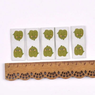 50Gb Karikatūras Dinozauru/Pingvīnu Etiķetes Apaviem Kopšanas somām Šūšana Apģērbs Roku darbs Piederumi DIY Amatniecība Audums Apģērbu Birkas