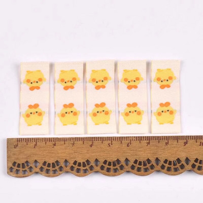 50Gb Karikatūras Dinozauru/Pingvīnu Etiķetes Apaviem Kopšanas somām Šūšana Apģērbs Roku darbs Piederumi DIY Amatniecība Audums Apģērbu Birkas