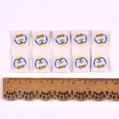 50Gb Karikatūras Dinozauru/Pingvīnu Etiķetes Apaviem Kopšanas somām Šūšana Apģērbs Roku darbs Piederumi DIY Amatniecība Audums Apģērbu Birkas