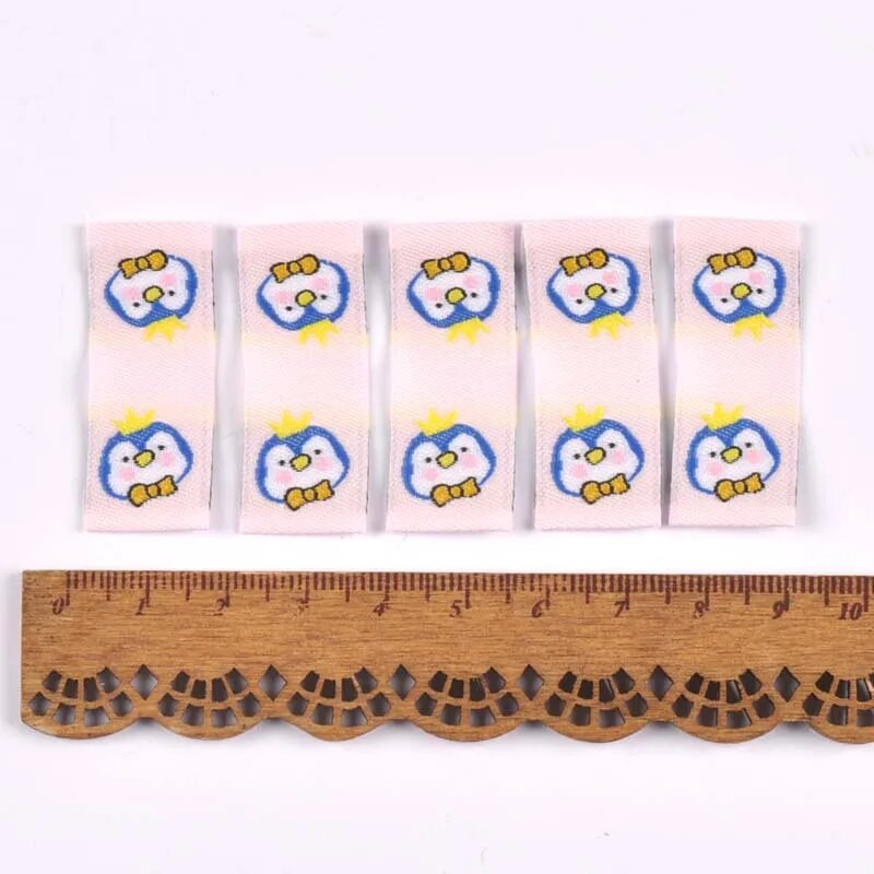 50Gb Karikatūras Dinozauru/Pingvīnu Etiķetes Apaviem Kopšanas somām Šūšana Apģērbs Roku darbs Piederumi DIY Amatniecība Audums Apģērbu Birkas