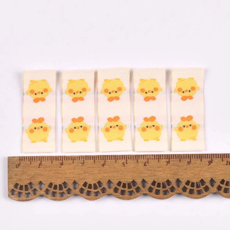 50Gb Karikatūras Dinozauru/Pingvīnu Etiķetes Apaviem Kopšanas somām Šūšana Apģērbs Roku darbs Piederumi DIY Amatniecība Audums Apģērbu Birkas