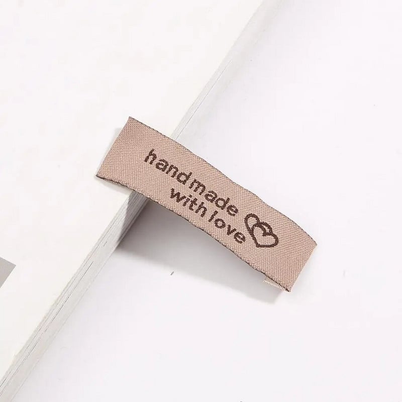 Ετικέτες καφέ χρώματος 20τμχ 15x50mm Χειροποίητες με αγάπη Υφασμάτινες ετικέτες DIY Αξεσουάρ Ράψιμο Ετικέτα ρούχων Grosgrain