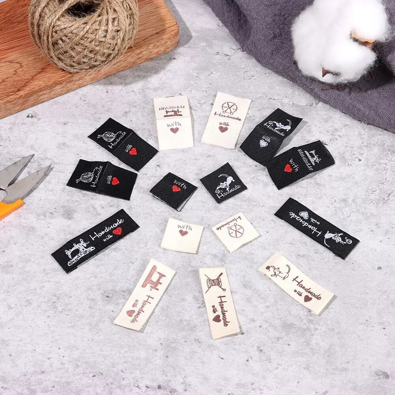 50 tk. Südamekujulised rõivasildid Käsitsi valmistatud armastusega Riietussildid Multifilm Kassikudumine Villapall DIY Rõivaste kootud aksessuaarid