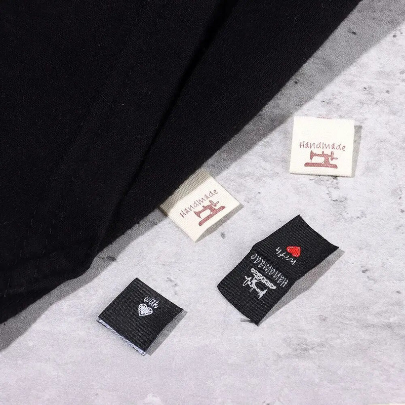 50 tk. Südamekujulised rõivasildid Käsitsi valmistatud armastusega Riietussildid Multifilm Kassikudumine Villapall DIY Rõivaste kootud aksessuaarid