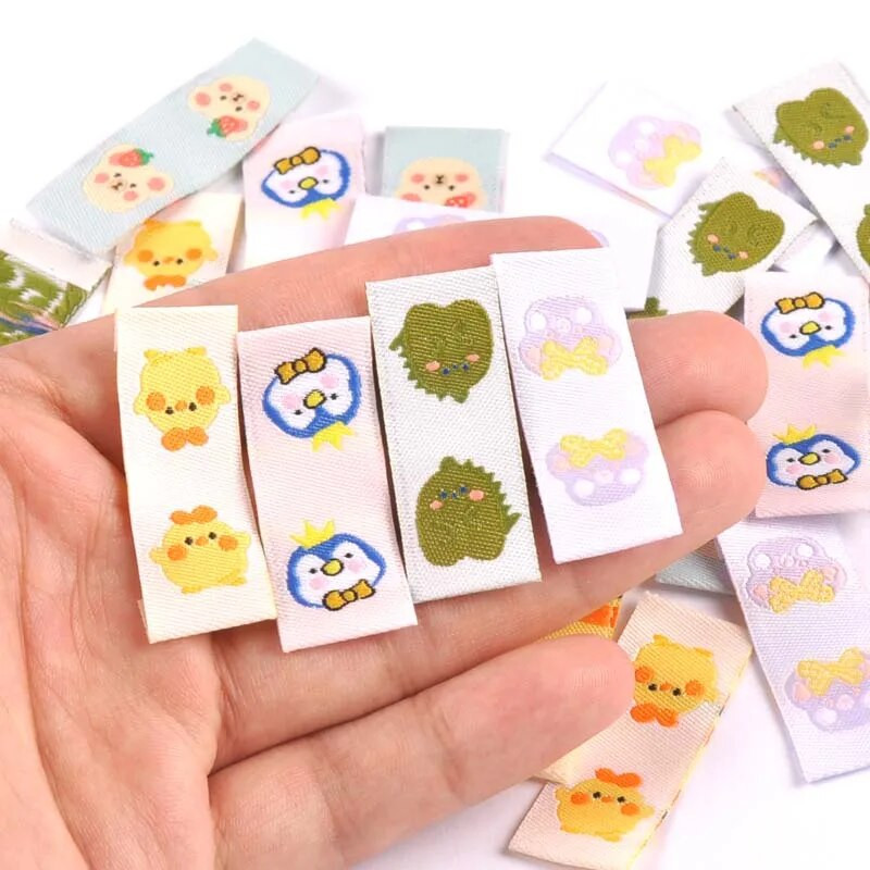 50gab. jauktas karikatūras dzīvnieki Izšūšanas uzlīmes apģērba šūšanai ar rokām darināti aksesuāri apģērbi kopšanas somiņas Birkas DIY Amatniecības piederumi