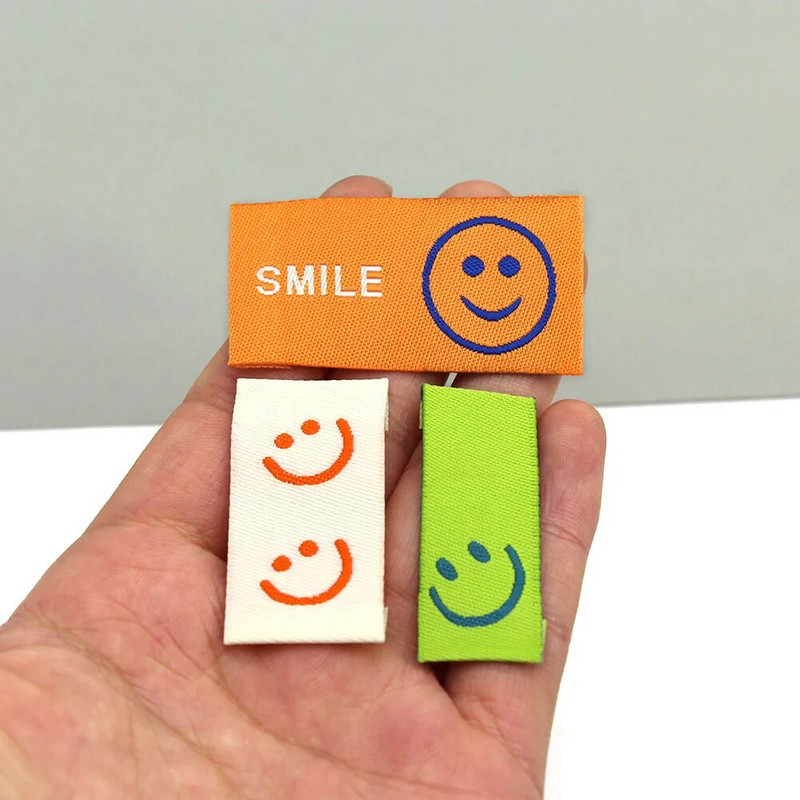 50τμχ Ετικέτες ρούχων Big Smile Πολύχρωμες χειροποίητες ετικέτες για ρούχα Ράψτε χειροτεχνίες Βαμβακερά χειροποίητα DIY Κασκόλ Καπέλα Τσάντες 47x25mm
