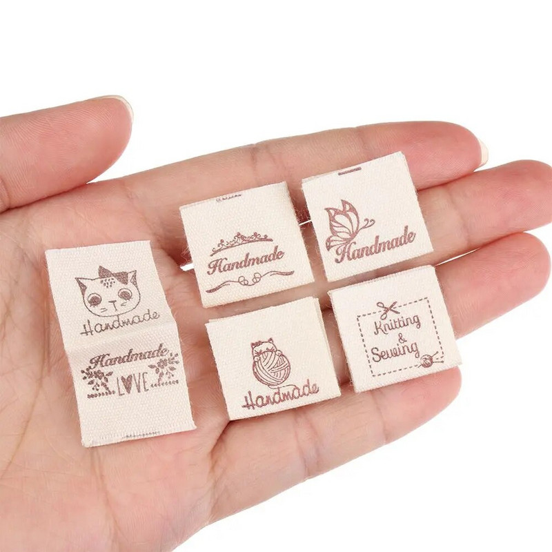 50 vnt. Rankų darbo su meilės audeklu Drabužių etiketės Animacinių filmų katės austi megzti reikmenys Širdies raštų drabužių etiketės siuvimo priedai